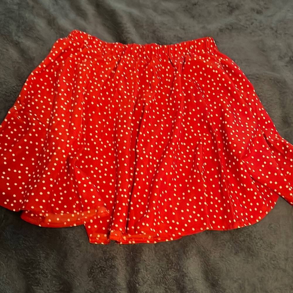 Red skirt with white polka dots from shein; Size large.